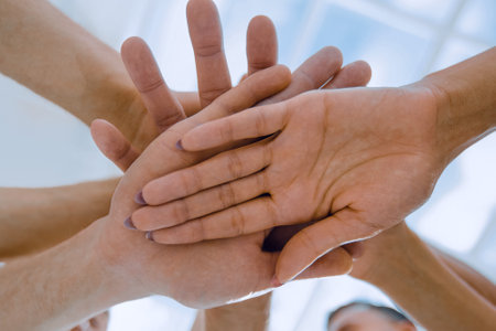 Multiracial Group of Friends with Hands in Stack