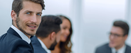 portrait of a successful businessman on the background of the office