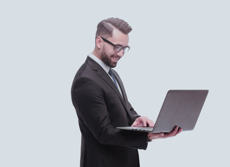 in full growth. businessman with open laptop.の写真素材