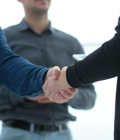 close up. handshake of young business people