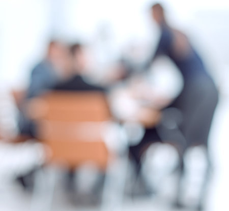 blurry image of a business team in the workplaceの写真素材