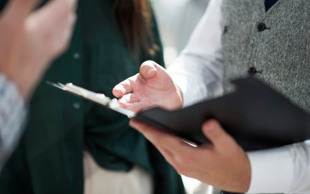 close up. a group of employees sitting at an office Deskの写真素材
