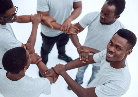 group of diverse guys standing in a circle . isolated on white