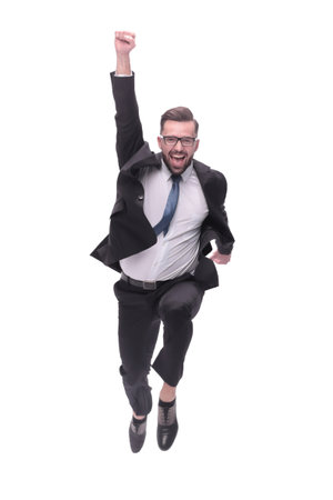 in full growth. happy dancing young businessmanの写真素材