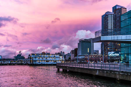 February 2016 pink sky sunset time at pier in Lower Manhattan, New York USAの写真素材