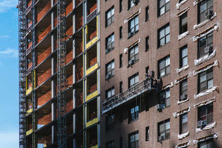 Close up detail of building exterior with reflection, Midtown Manhattan, New York City, United Statesのeditorial素材