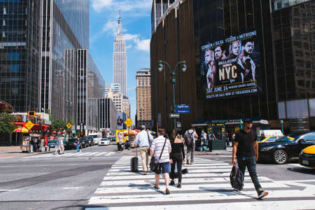 Passenger are crossing Eight Ave in front of Penn Station, New York USAのeditorial素材