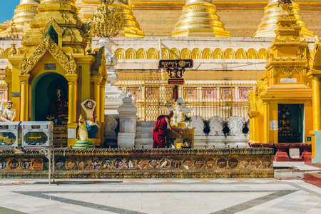 Yangon, Myanmar - FEB 19th 2014: Ordination ceremony at Shwedagon Pagodaのeditorial素材