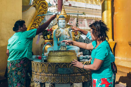 Yangon, Myanmar - FEB 19th 2014: Ordination ceremony at Shwedagon Pagodaのeditorial素材