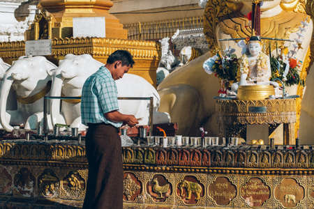 Yangon, Myanmar - FEB 19th 2014: Ordination ceremony at Shwedagon Pagodaのeditorial素材