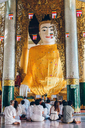 Yangon, Myanmar - FEB 19th 2014: Ordination ceremony at Shwedagon Pagodaのeditorial素材