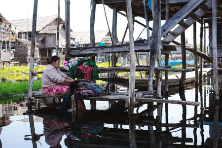 Inle Lake, Myanmar: FEB 25, 2014: Wooden stilt houses on piles inhabited by the tribe of Intharのeditorial素材