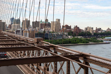 New York City / USA - JUN 20 2018: Brooklyn Bridge with buildings at early morning in New York Cityのeditorial素材