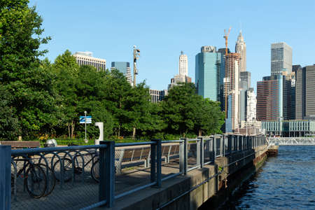 New York City / USA - JUN 25 2018: Brooklyn Bridge Park with Lower Manhattan skyline in early morningのeditorial素材