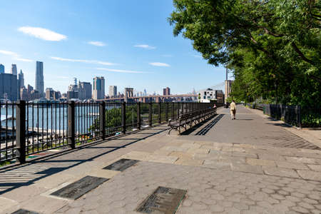 New York, City / USA - JUL 10 2018: Fort Stirling Park in clear afternoon of Lower Manhattan Skyline...