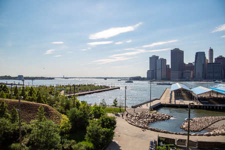 New York, City / USA - JUL 10 2018: Fort Stirling Park in clear afternoon of Lower Manhattan Skyline view from Brooklyn New York Cityのeditorial素材