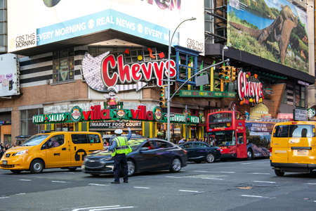 New York City / USA - JUL 13 2018: Times Square street view at rush hour in midtown Manhattan