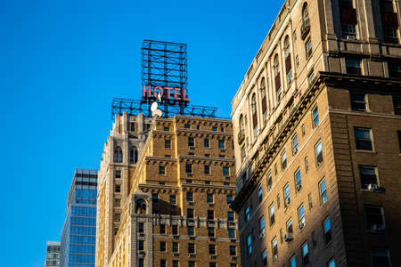 New York City / USA - JUL 13 2018: Skyscraper and old building view  from street in midtown Manhattanのeditorial素材