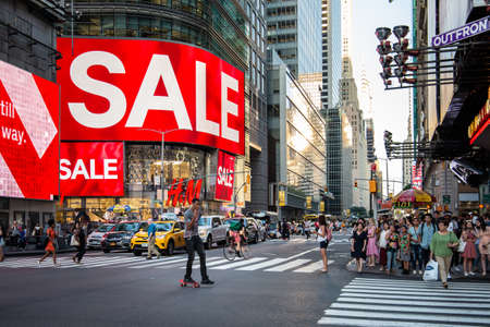 New York City / USA - JUL 13 2018: Times Square street view at rush hour in midtown Manhattan