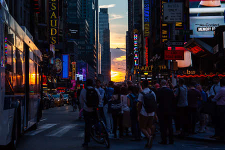 New York City / USA - JUL 13 2018: Manhttanhenge street view from Times Square at rush hour in midtown Manhattanのeditorial素材