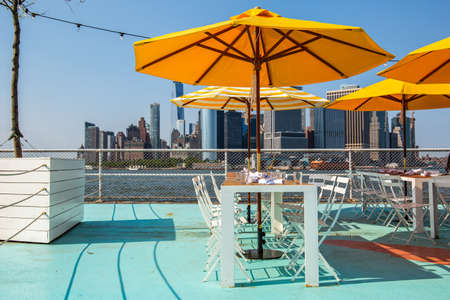 New York City / USA - JUL 14 2018: Oyster bar of Governors Island on a clear friday afternoon
