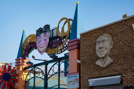 Brooklyn NY - USA - May 22 2019: Coney island clown face sign on the wall and Luna Park in Coney Islandのeditorial素材