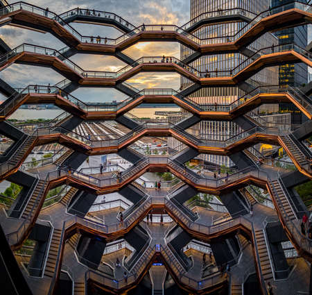 New York City - USA - Jul 2 2019: Modern architecture building Vessel spiral staircase is the centerpiece of the Hudson Yards in New York Cityのeditorial素材