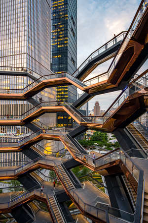 New York City - USA - Jul 2 2019: Modern architecture building Vessel spiral staircase is the centerpiece of the Hudson Yards in New York Cityのeditorial素材