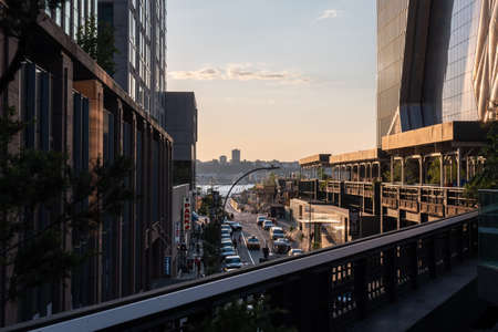 New York NY - USA - Jul 24 2019: The High Line Park in New York with locals and tourists. The High Line is a popular linear park built on the elevated train tracks above Tenth Ave in New York Cityのeditorial素材
