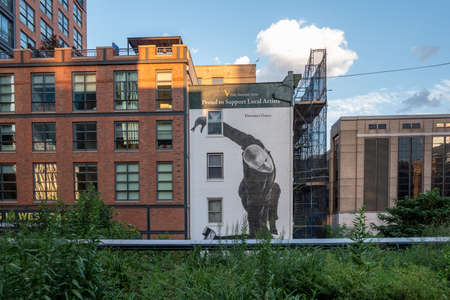 New York NY - USA - Jul 24 2019: The High Line Park in New York with locals and tourists. The High Line is a popular linear park built on the elevated train tracks above Tenth Ave in New York Cityのeditorial素材