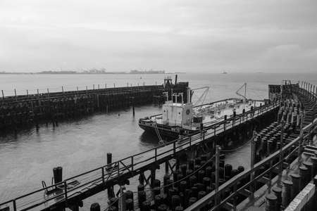 New York NY - USA - Aug 14 2019: Staten Island Ferry on the New York Harbor against of Lower Manhattan skyscrapersのeditorial素材