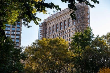 New York City - USA - Oct 24 2019: Fall foliage color of Madison Square Park Flatiron District in...