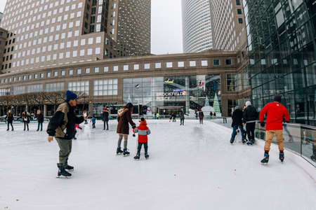 New York City - USA - Dec 6 2019: People skating in the Rink at Brookfield Place in holiday season
