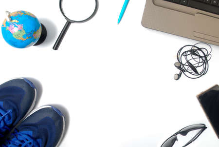 Travel item from top view. Flat lay isolated with white backgroundの写真素材