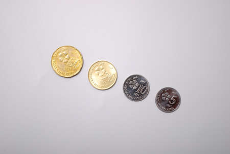 A MYR coin isolated with white background. Top view with copy spaceの写真素材