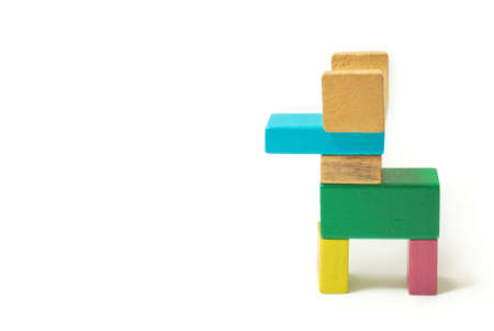 Toys blocks, multicolor wooden bricks, children colorful building game pieces of kids organize toy. Flat lay and isolated white backgroundの写真素材