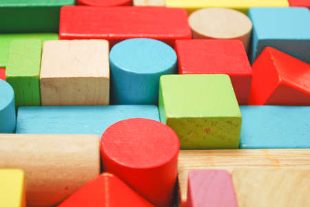 Toys blocks, multicolor wooden bricks, children colorful building game pieces of kids organize toy. Flat lay and isolated white backgroundの写真素材