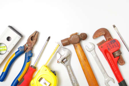 Assorted work and home tools. Isolated white background and copy space