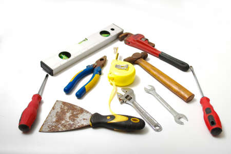 Assorted work and home tools. Isolated white background and copy space