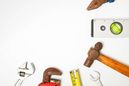Assorted work and home tools. Isolated white background and copy spaceの写真素材