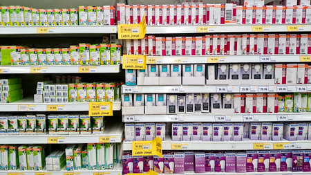 MELAKA, MALAYSIA - April 13, 2018 : Assorted brand of light bulb on shelf rack display in the Tesco store.のeditorial素材