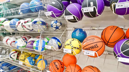 MELAKA, MALAYSIA - April 13, 2018 : Assorted brand ball on shelf rack display in the Tesco store.