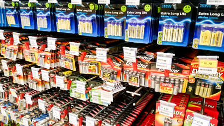 MELAKA, MALAYSIA - April 13, 2018 : Assorted brand and type of battery on shelf rack display in the...