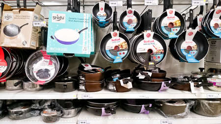MELAKA, MALAYSIA - April 13, 2018 : Assorted brand and type of pan on shelf rack display in the Tesco store.のeditorial素材