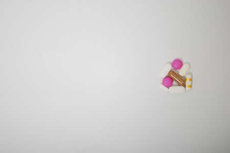 Pills and capsule on white background. Selective focus and copy spaceの写真素材