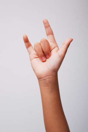 Hand sign symbol isolated white backgroundの写真素材