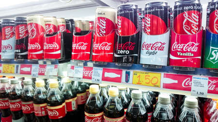 MELAKA, MALAYSIA - May 22, 2018 : A Coca-Cola drink in can display at freezer market. Coca-cola it the most known soft drink brand in the worldのeditorial素材