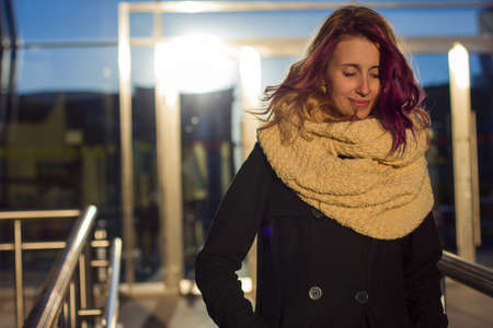 happy girl comes out of the doorsの写真素材