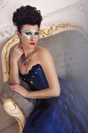 woman in dress Baroque sitting on the chair