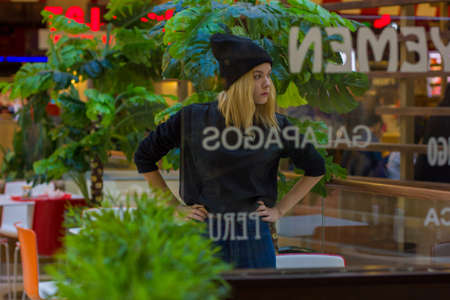 portrait of stylish young girl in the Mall